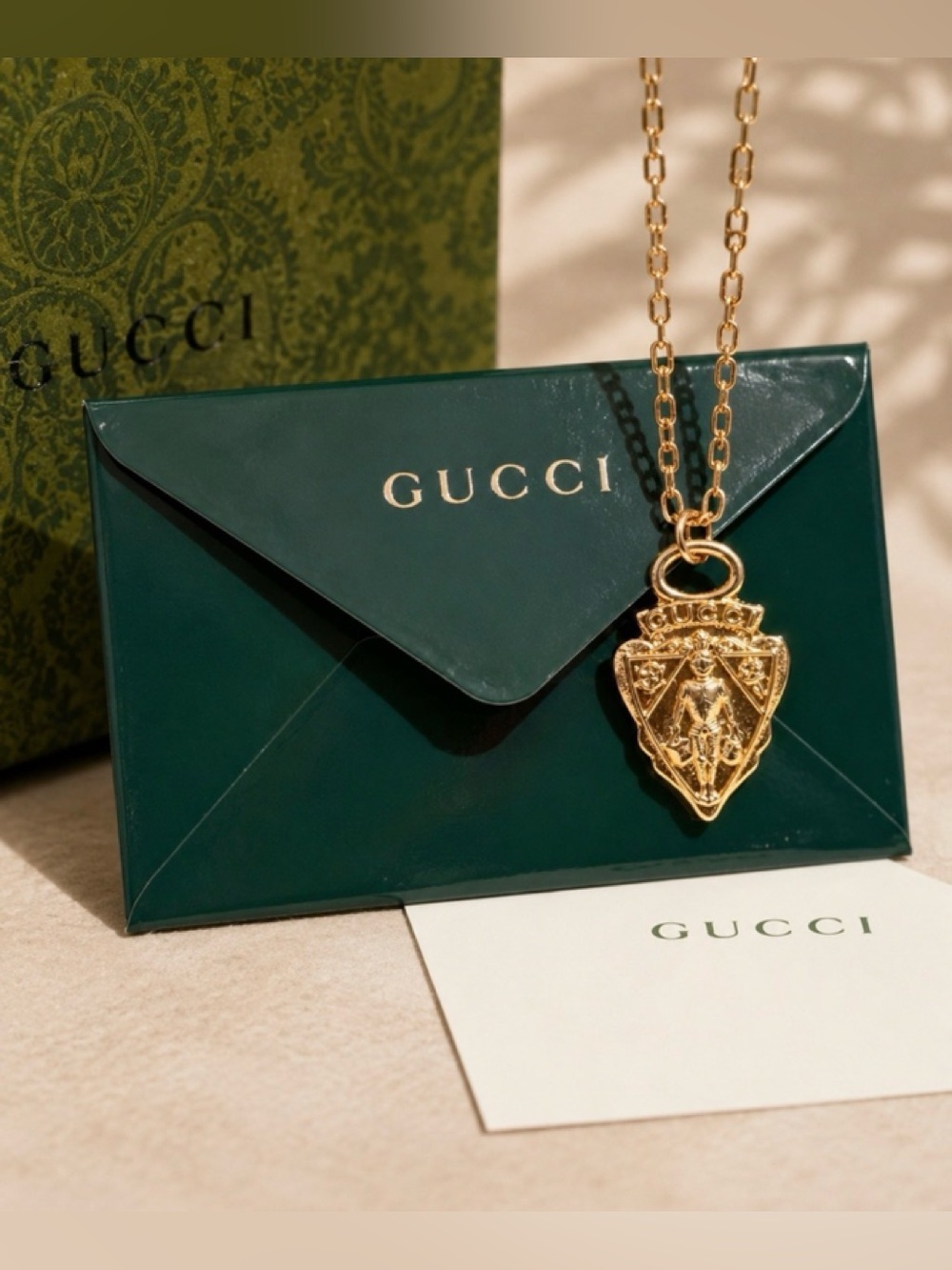 Gucci authentic Gold-tone Crest Knight Pendant Charm necklace